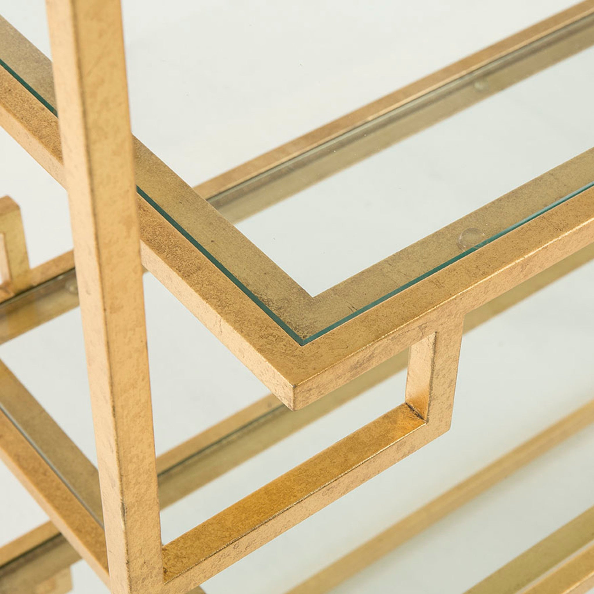 Gold metal frame bookshelf with asymmetrical shelves, ideal for luxurious and modern home office decor, Good Build Quality.