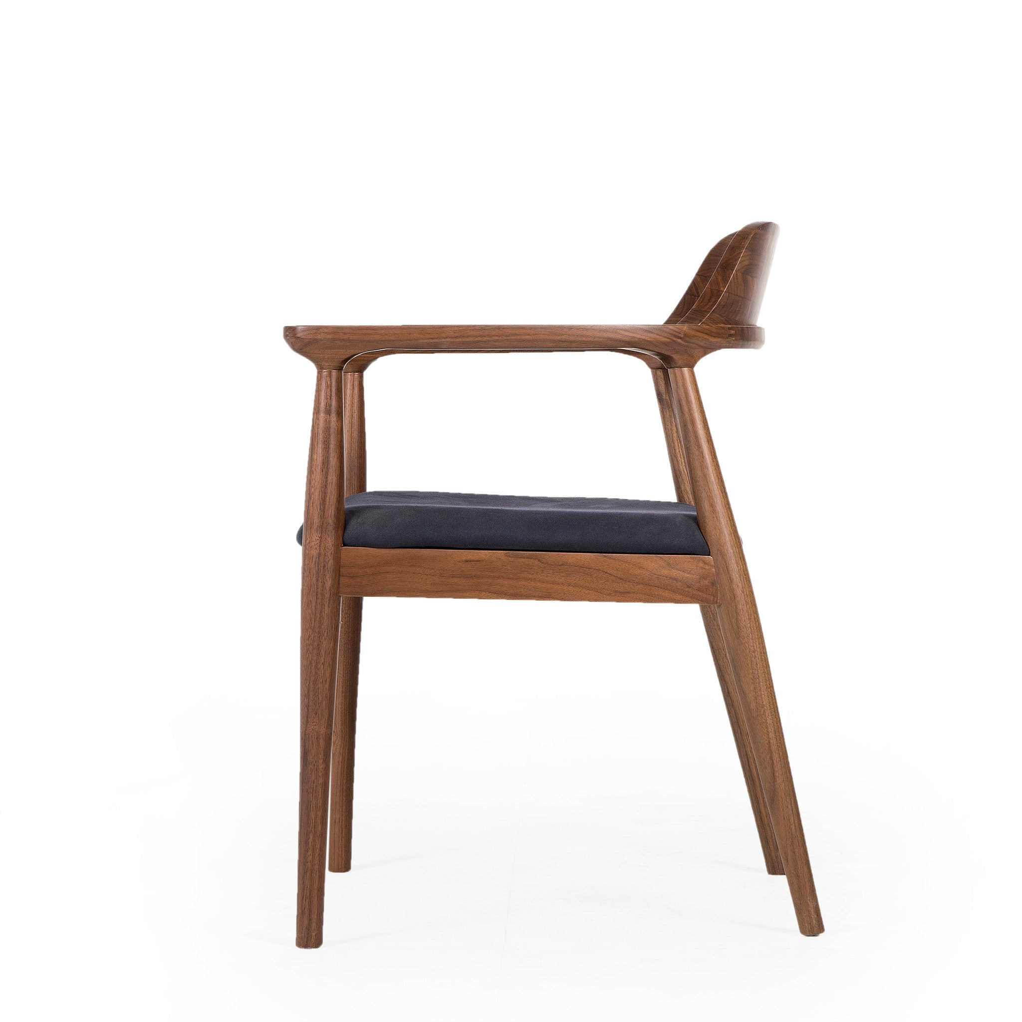 Mid-century modern walnut armchair with a curved backrest and a dark upholstered seat cushion, suitable for stylish dining rooms, side view.