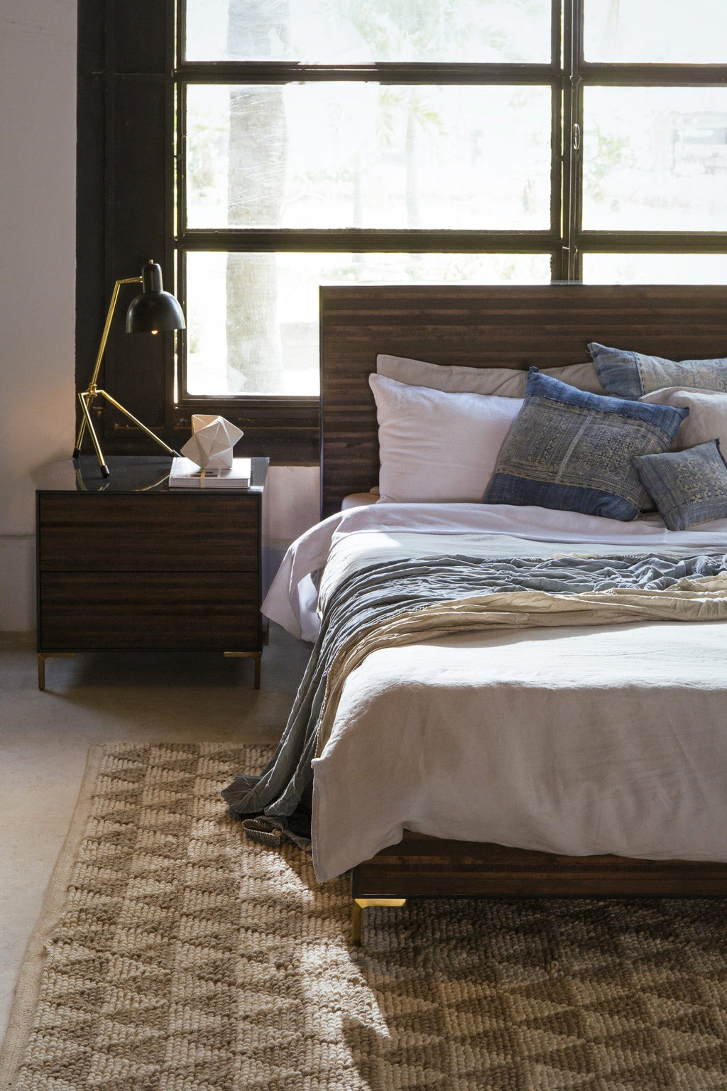 US Queen bed with a modern dark wood design and sleek gold legs, offering a contemporary and elegant addition to any bedroom, Living Room View 1.