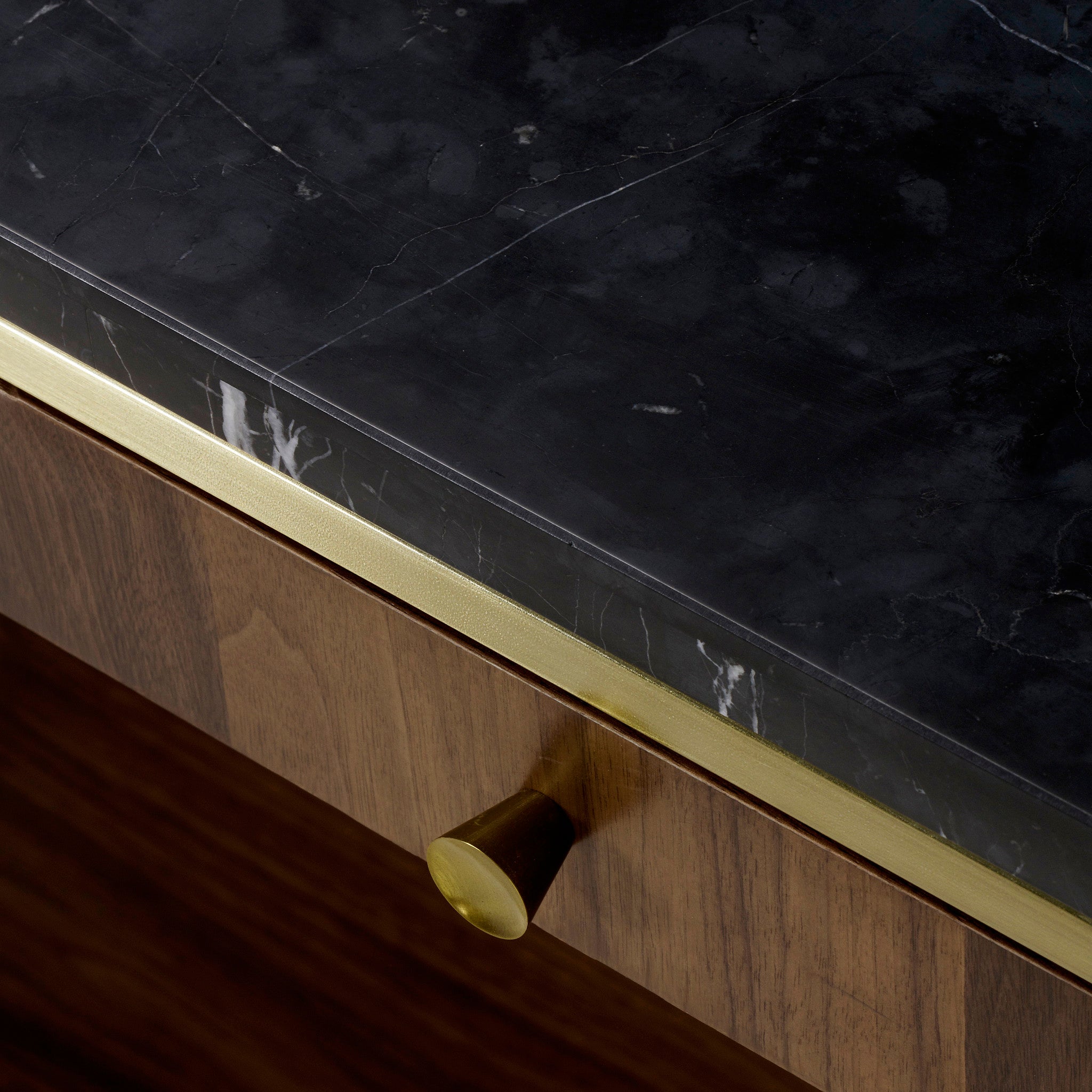 Small console table with a dark marble top, walnut veneer drawers, and gold metal legs, offering a luxurious and compact design for any room, Detail View 3.