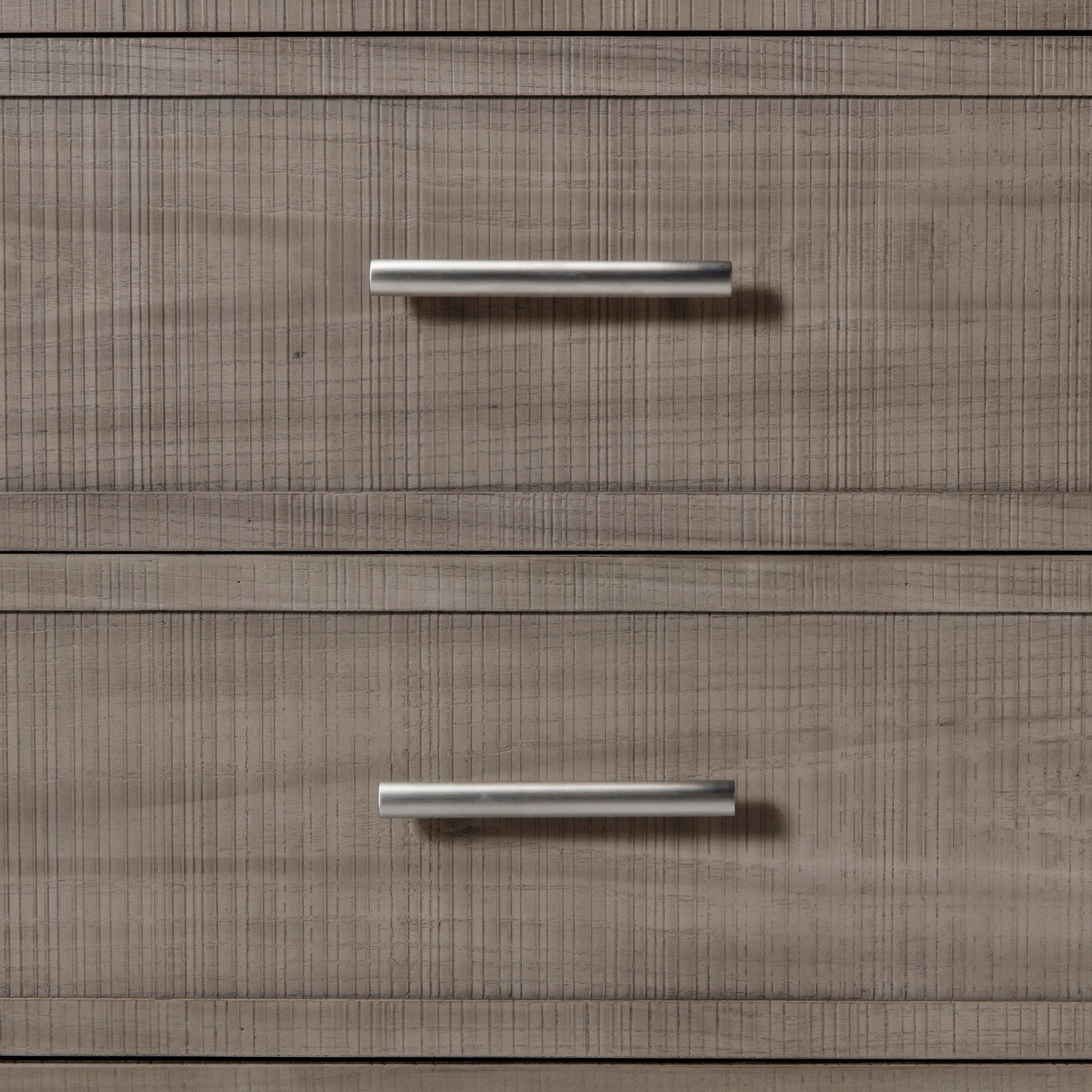 Modern three-drawer dresser in a grey and pewter finish, offering sleek metal handles and ample storage for bedroom essentials, Detail view 3.
