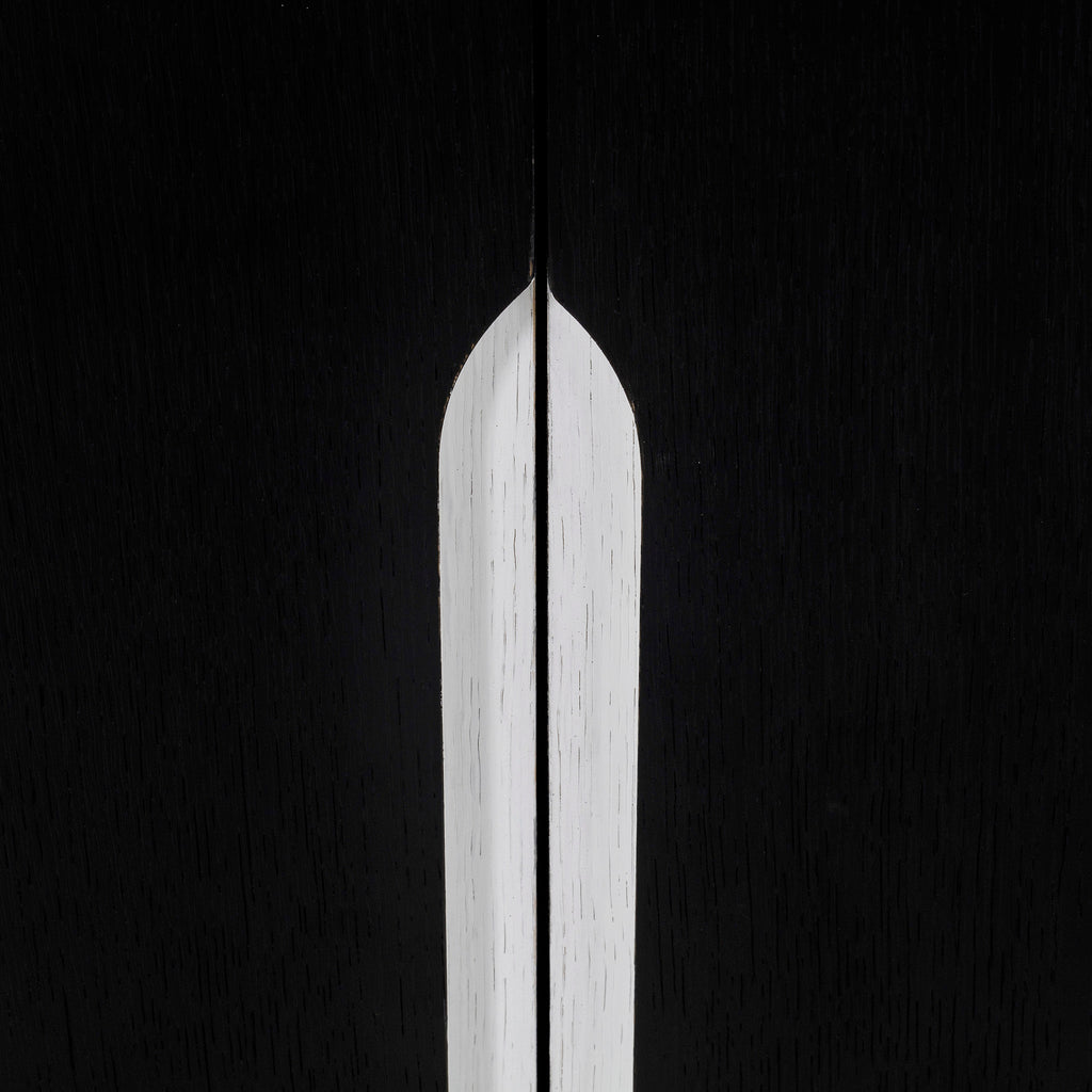 Sleek black sideboard with metallic handles, ideal for contemporary dining room storage and decor, Detail Look 3.