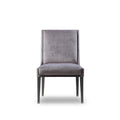 Modern grey velvet dining chair with high back and black wooden legs, perfect for contemporary room decor, Front View.