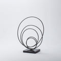 Iron Loop Statuette