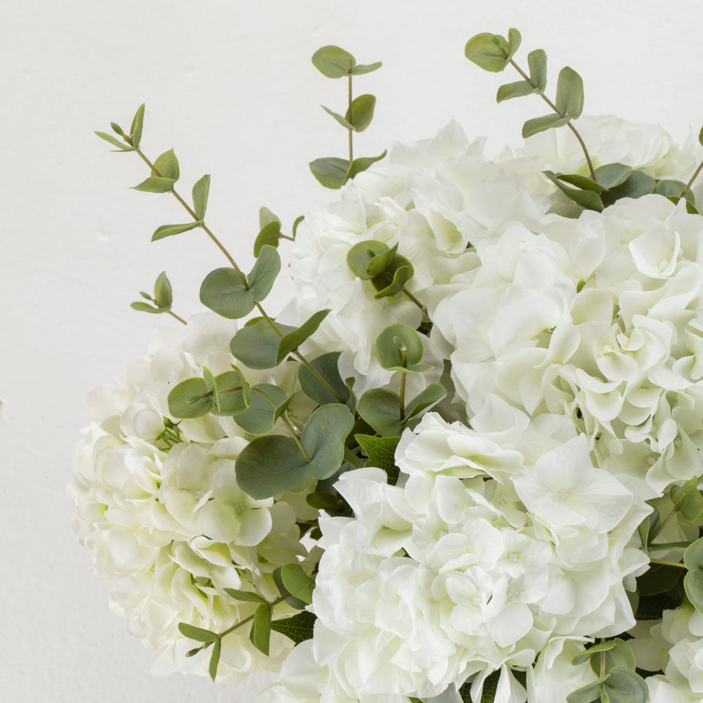 White Hydrangea Eucalyptus Bouquet in Glass Vase