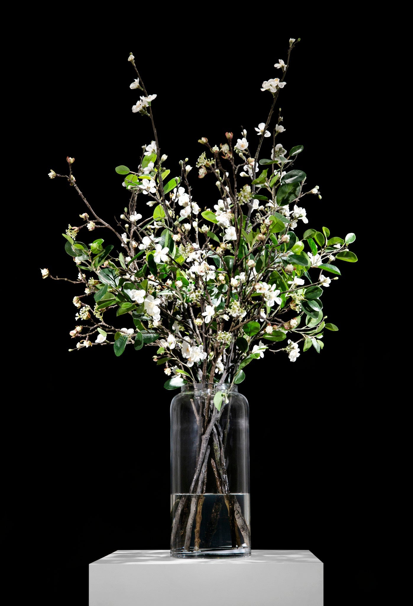 Mixed Blossom and Leaves in Glass Vase