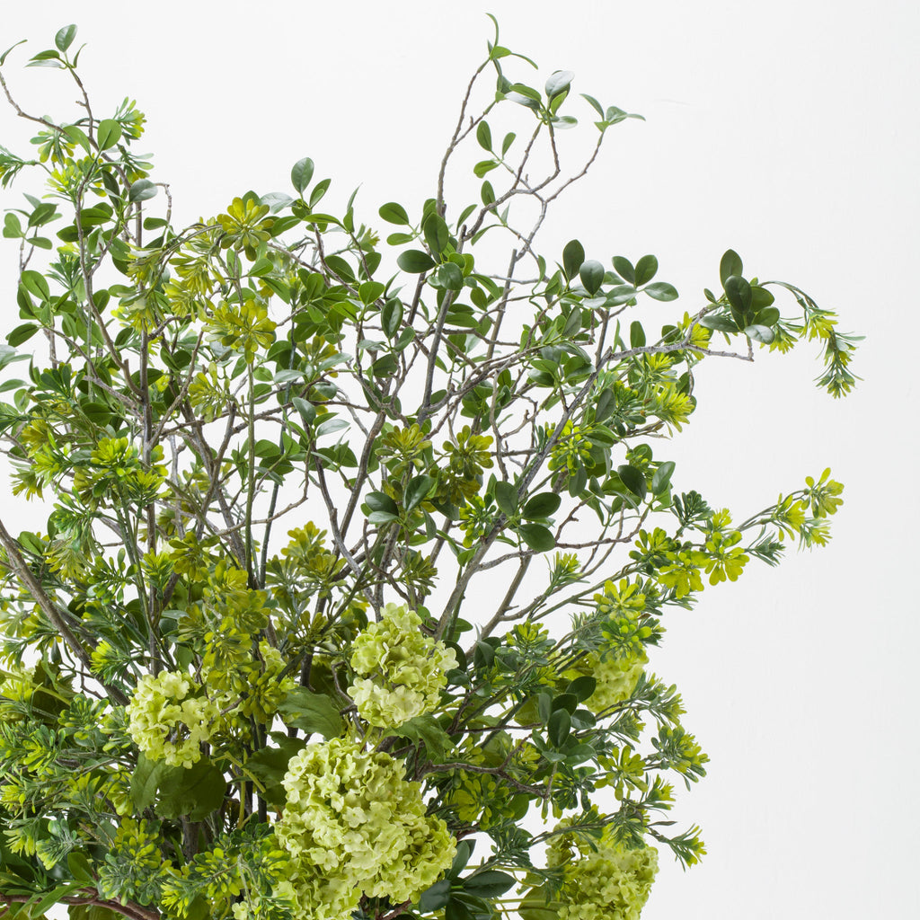 Mixed Greenery In Tall Glass Square Vase