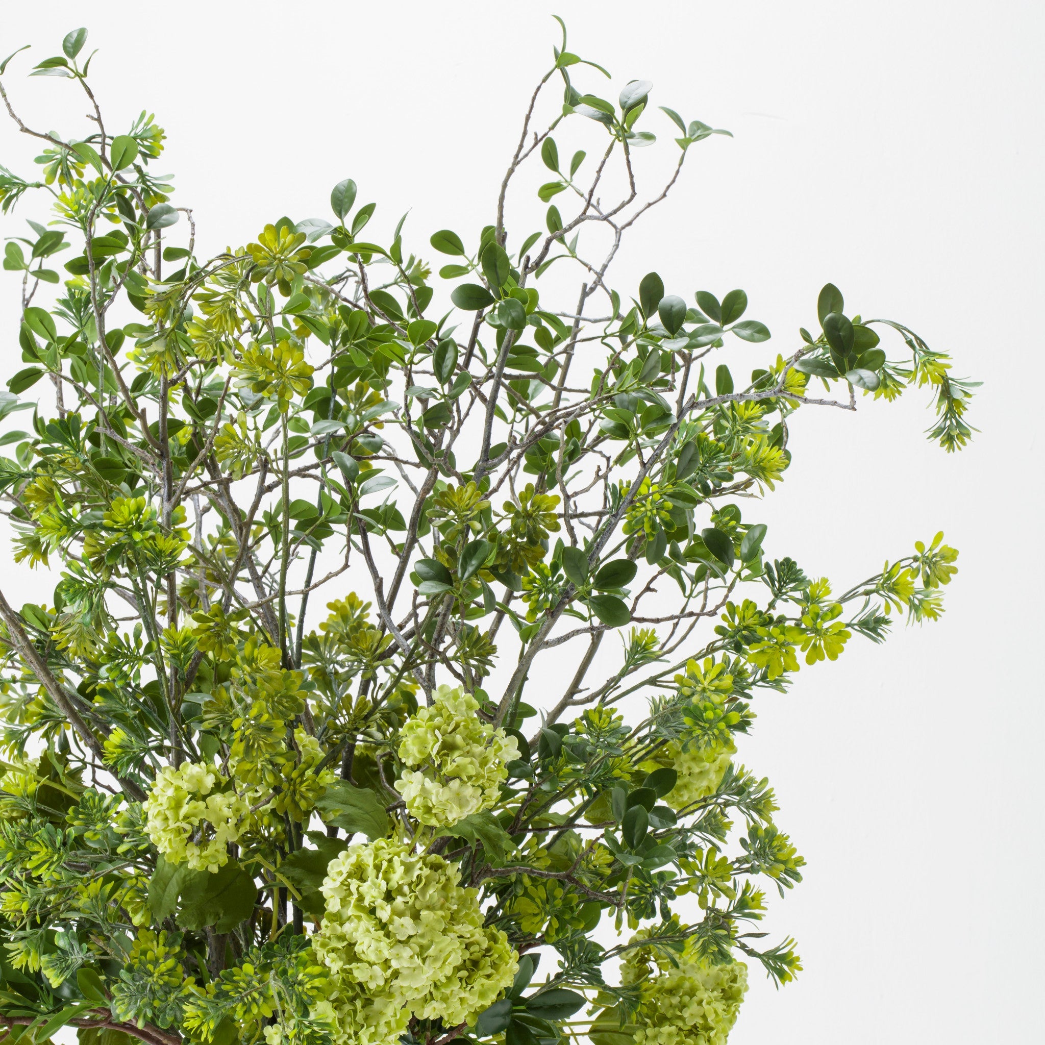 Mixed Greenery In Tall Glass Square Vase