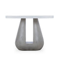 Modern minimalist white round table with a unique concrete pedestal base, suitable for contemporary dining or living rooms.