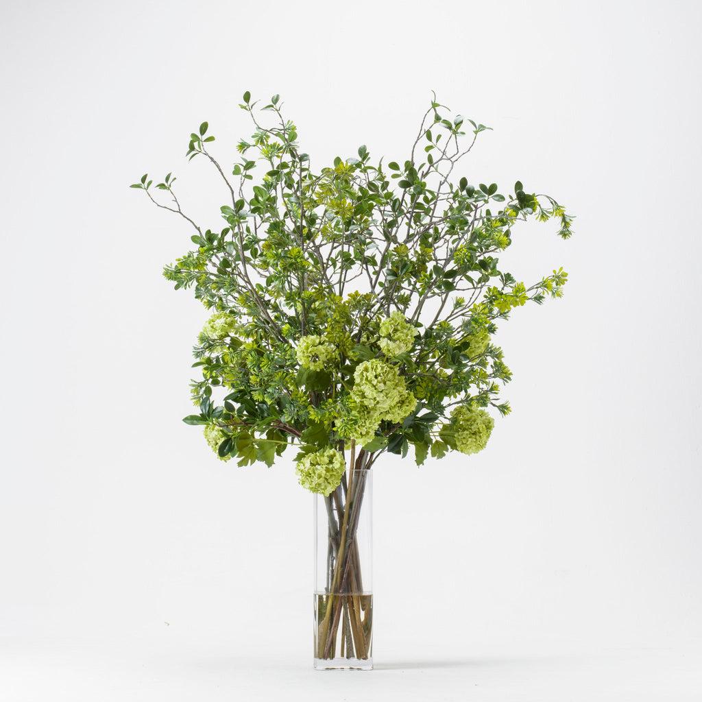 Mixed Greenery In Tall Glass Square Vase